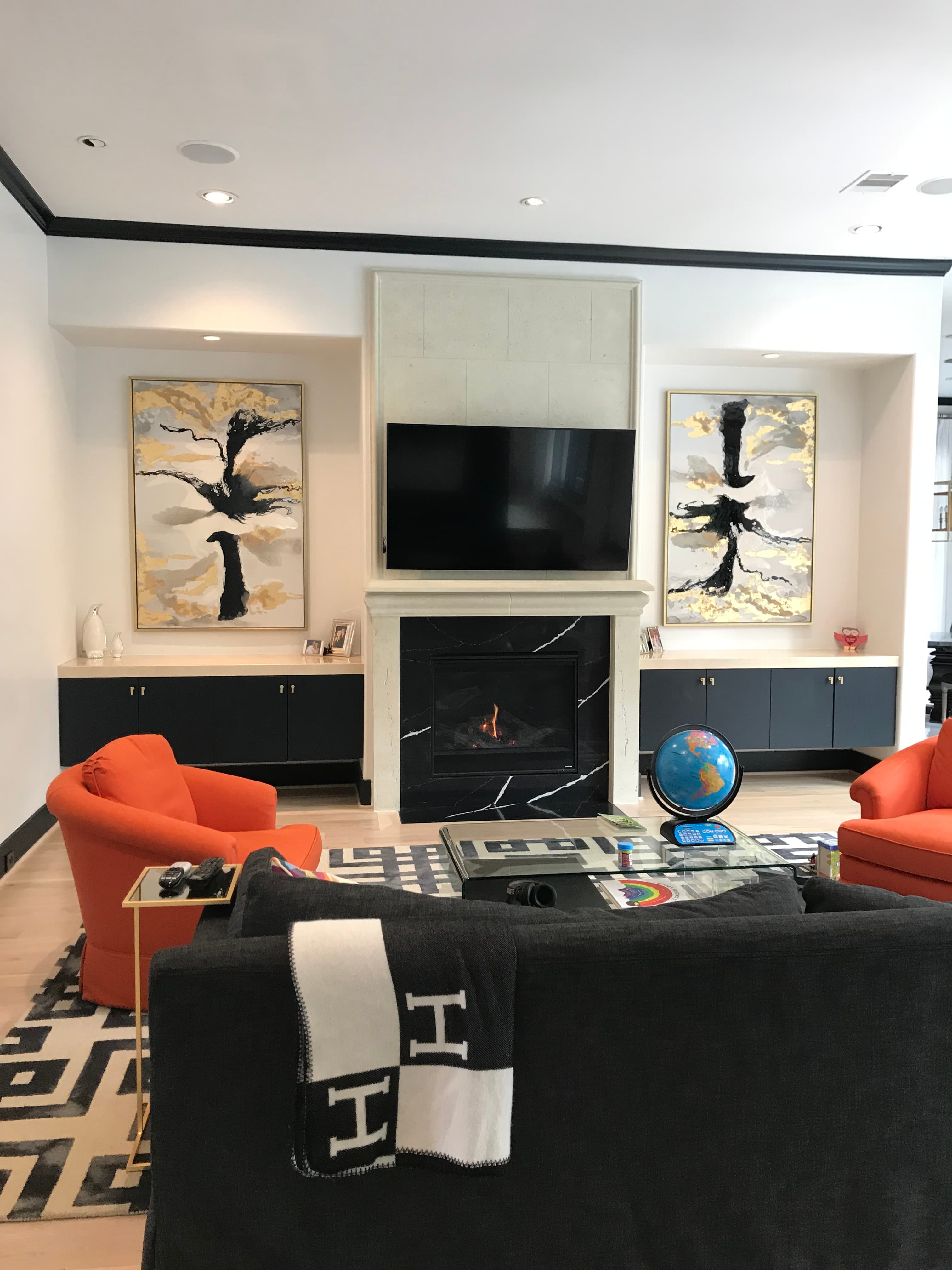 Custom stone fireplace surround in a modern living room